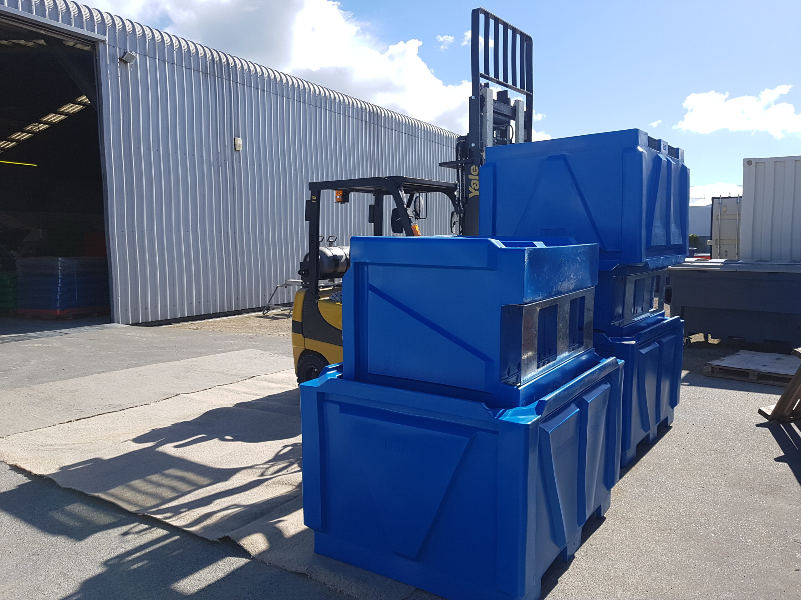 blue stackable box pallet bins with forklift