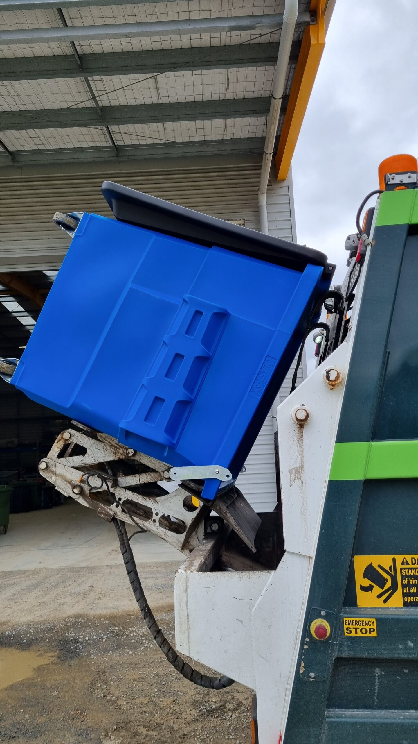 blue waste bin rubbish truck disposal