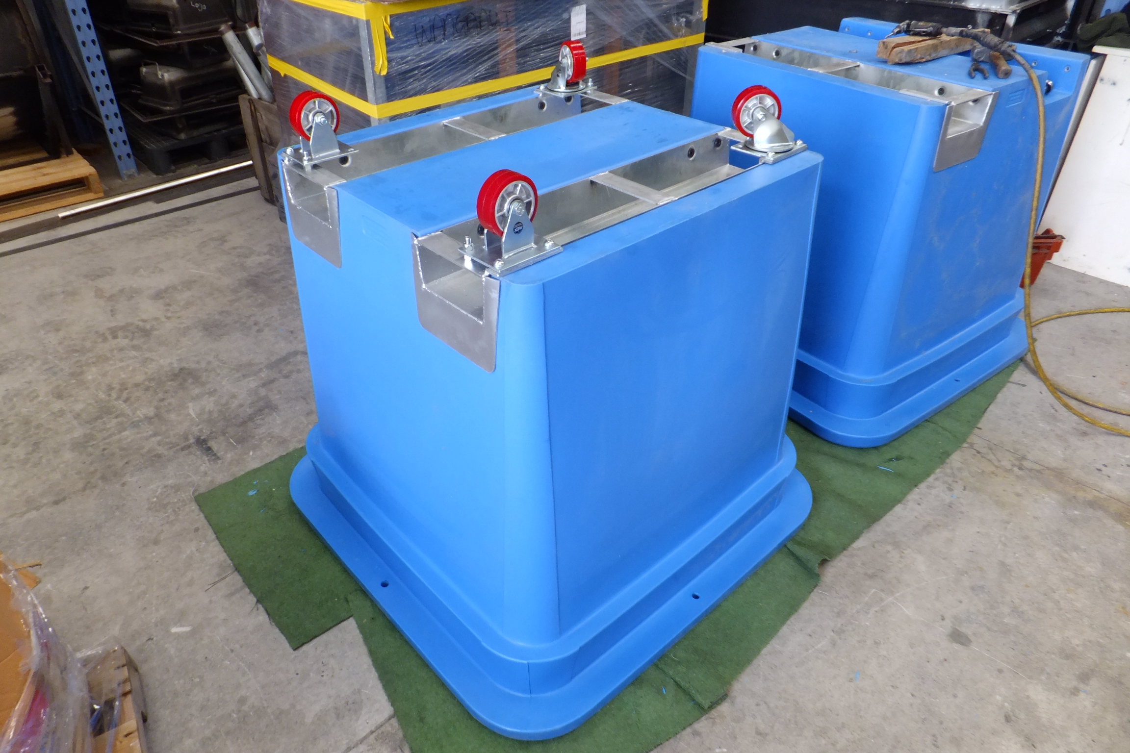 blue industrial grade plastic bins with wheels
