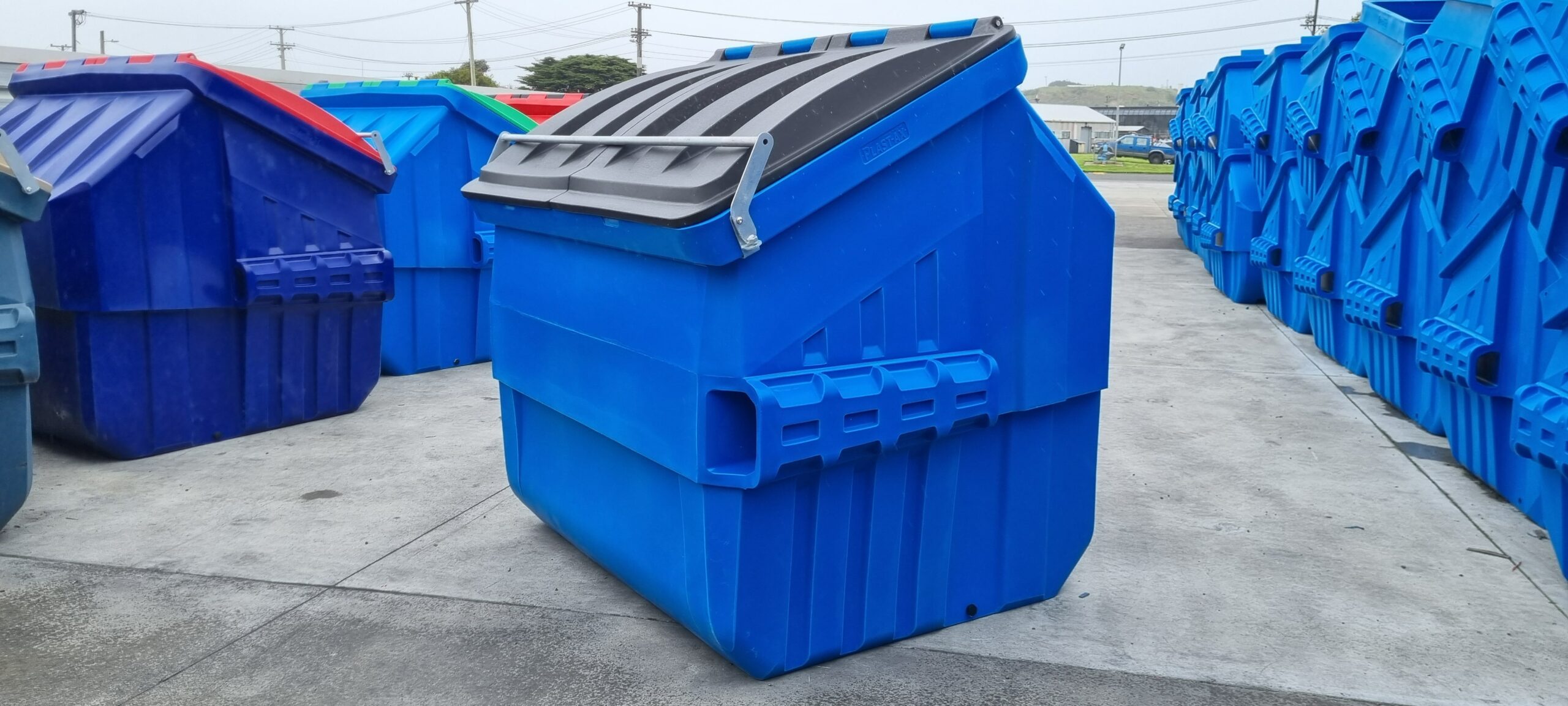 blue front FEL mini skip bins